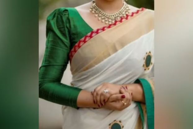 Green blouse with white saree